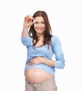 pregnant woman with a pill