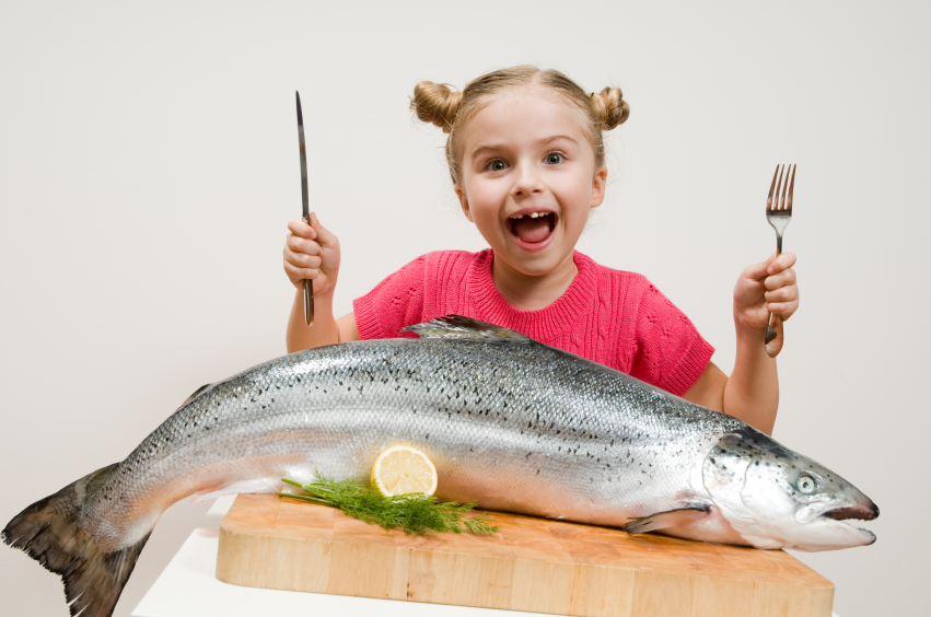girl eating fish
