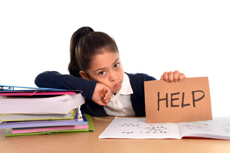 young girl holding "help" sign
